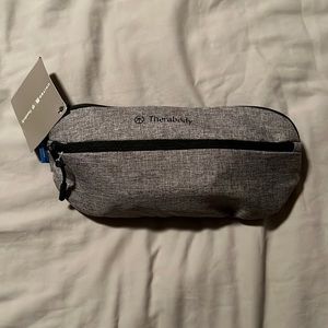 NWT United Airlines Therabody Waist Pack Amenity Kit Grey. All content is inside